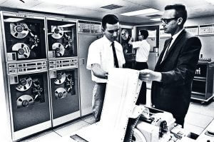 Two man analysing the report